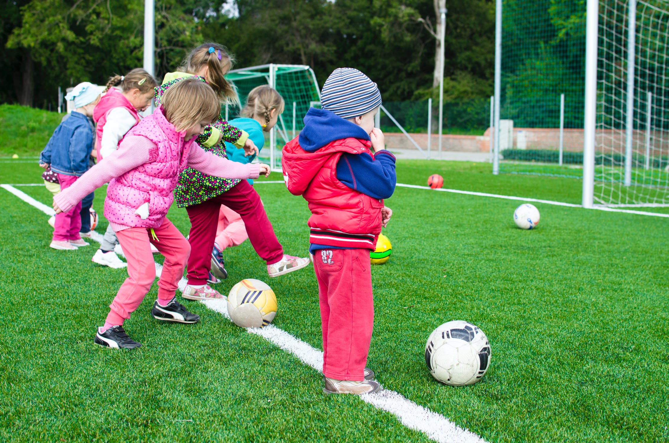 Children Engaged in Soccer Practice image in article How can child care programs handle drop-off, safety, and schedules during the 2026 World Cup in big cities?