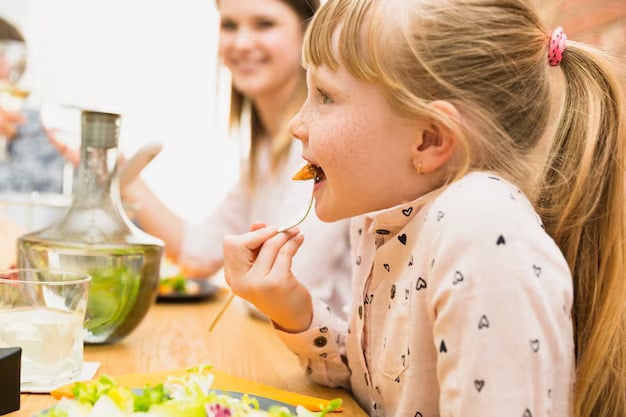 Child Enjoying a Meal image in article How Can We Help Children Develop Lifelong Healthy Eating Habits?