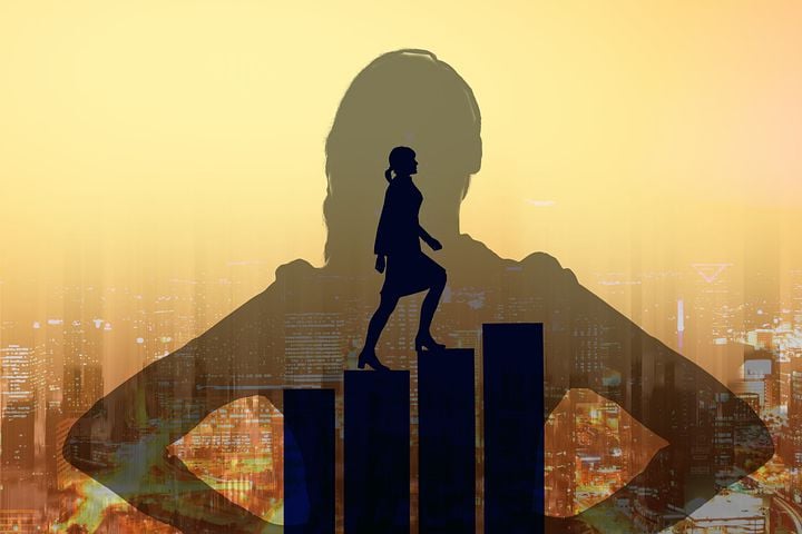 Empowered Woman Climbing Success
